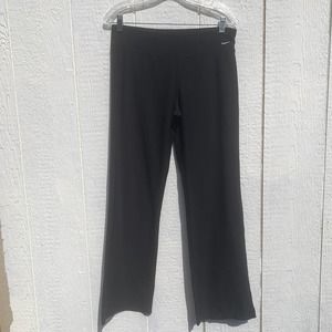 Nike black mid rise straight cut leggings size medium nike logo on hip